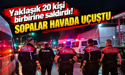 Yaklaşık 20 kişi birbirine saldırdı! Sopalar havada uçuştu