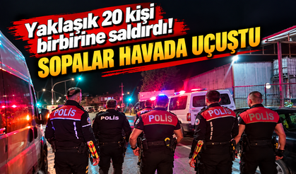 Yaklaşık 20 kişi birbirine saldırdı! Sopalar havada uçuştu